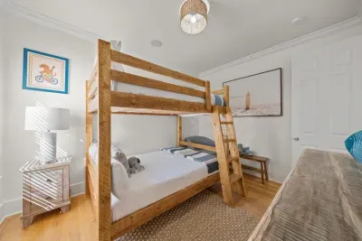 Kids will love the bunk beds, with a ladder, a bedside lamp and plenty of space to sleep and play.