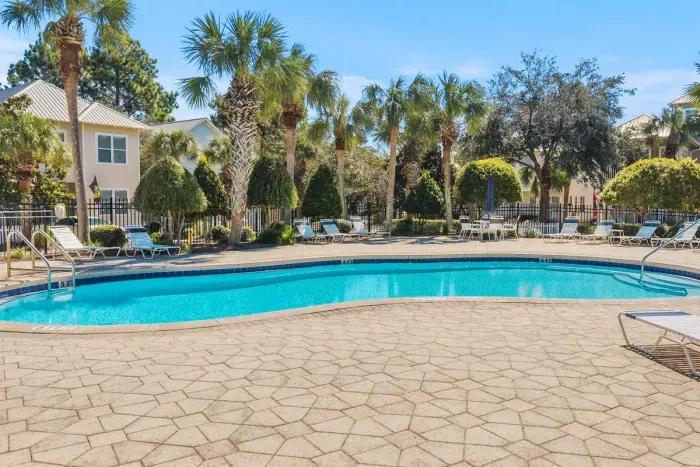The community pool is right out the front door, so a refreshing dip is only a few steps away after a day at the beach.