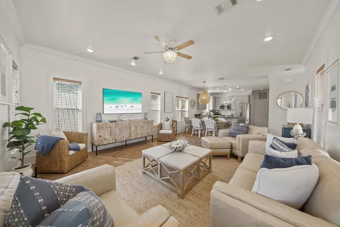Settle into the upstairs living room, where big windows pour in sunshine and there is plenty of seating for the whole crew to gather for movie nights and games.
