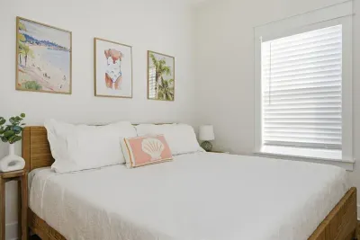 Guest bedroom with king bed and calming coastal decor