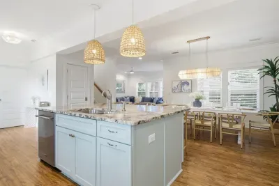 Open kitchen and dining space designed for cooking, gathering, and connection