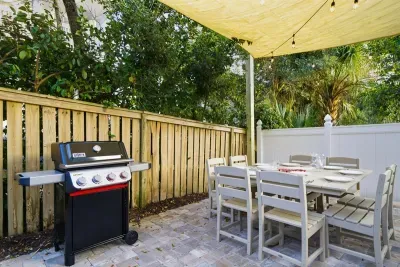 Propane gas grill and outdoor dining space for casual evenings