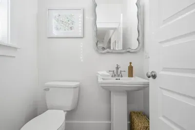 First-floor half bath conveniently located near the main living area