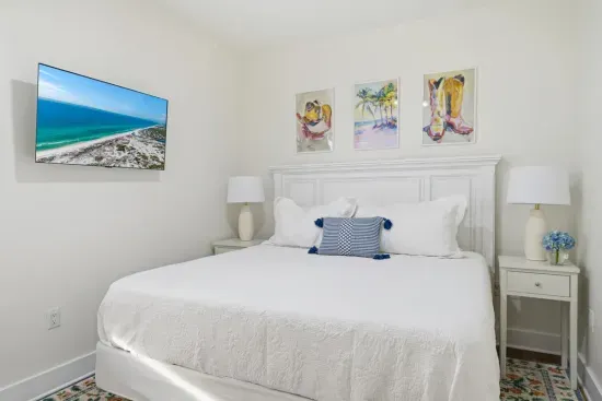 Guest bedroom with king bed and comfortable, inviting layout