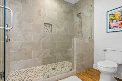 Master Bathroom Walk-in tiled shower with glass enclosure