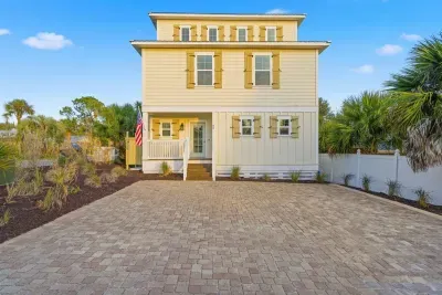Front exterior of the home with private parking area