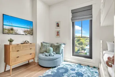 Their own TV, their own dresser, and a round swivel chair pulled up to the window. Independence for them, quiet for you.