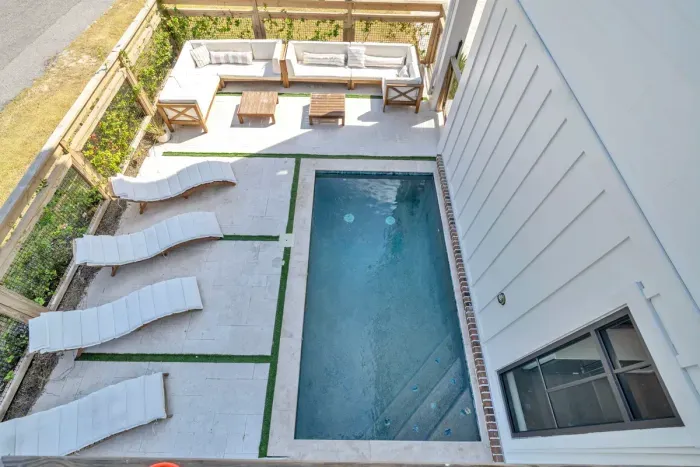 Your own heated pool, four loungers, and a full outdoor sofa, all behind a privacy fence. The water is ready whenever you are, so claim a chair and stay out until the sun drops.