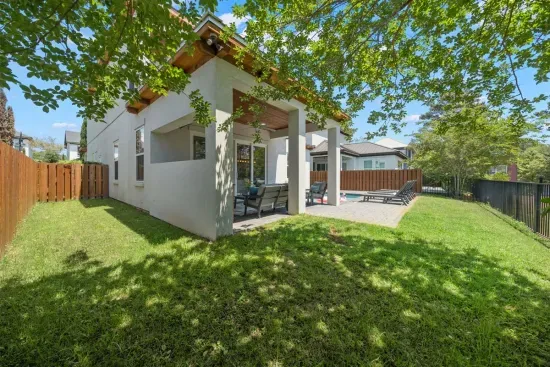 A fully fenced backyard perfect for kids and dogs to roam freely — private, safe, and all yours.