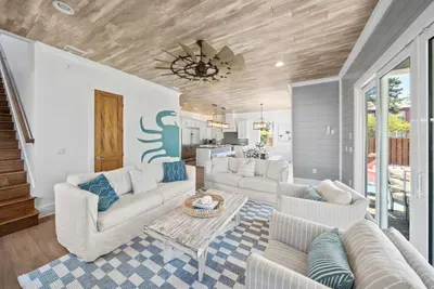 Bright, coastal, and comfortable — the main living space where everyone naturally comes together.