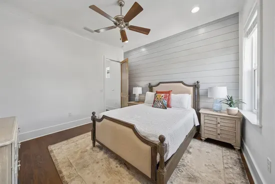 The second queen bedroom — light-filled, well-appointed, and connected to the shared Jack and Jill bath.