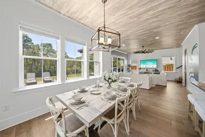 Gather the whole crew around the farmhouse table — seating for 8 with natural light pouring in.