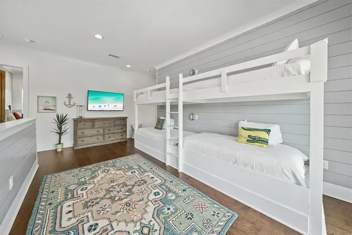 A dedicated kids' zone on the second floor — built-in bunks, room to spread out, and memories in the making.