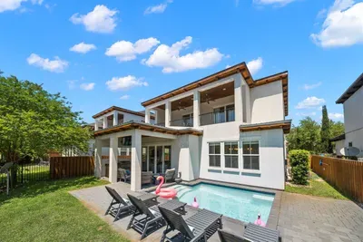 Private heated pool and fully fenced backyard — your own outdoor retreat steps from the living room.