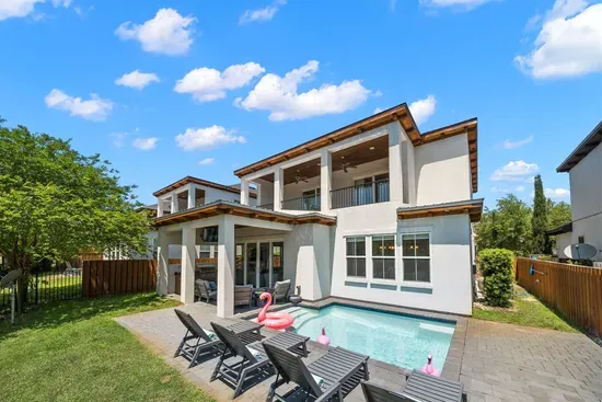 Private heated pool and fully fenced backyard — your own outdoor retreat steps from the living room.
