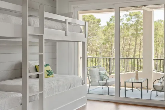 Step outside from the second floor to your own private deck — morning coffee never felt so good.