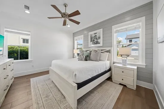 King Bed on First Floor. Bright and airy with coastal touches — a restful retreat after a full day at the beach.