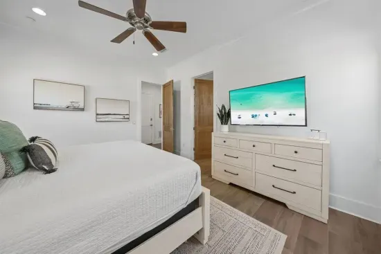 The ultimate multigenerational suite — king bed, 55" TV, and a private ensuite, all on the first floor.