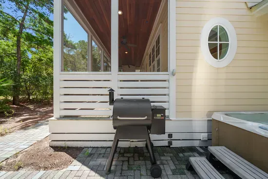 Fire up the Traeger pellet smoker and let dinner take its time while the hot tub warms beside it. Please note the built-in gas grill is currently out of service.