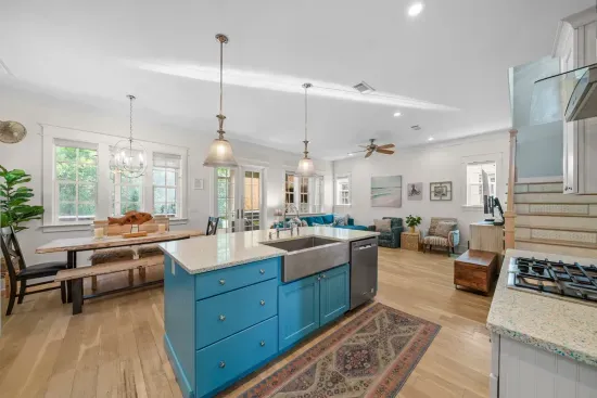 Kitchen, dining, and living all open to one another, so whoever is cooking is still part of the conversation.