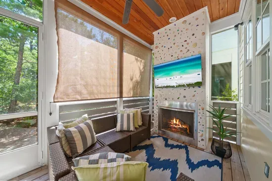 Pull the shades, put on a movie, and let the screened porch do the rest. Ceiling fans and seating for the whole group.