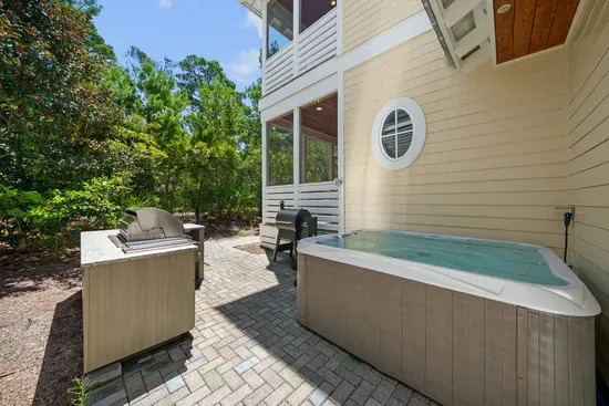 Soak under the pines in the private hot tub, with the outdoor kitchen right alongside. Please note the built-in gas grill is currently out of service; the Traeger pellet smoker is ready to go.