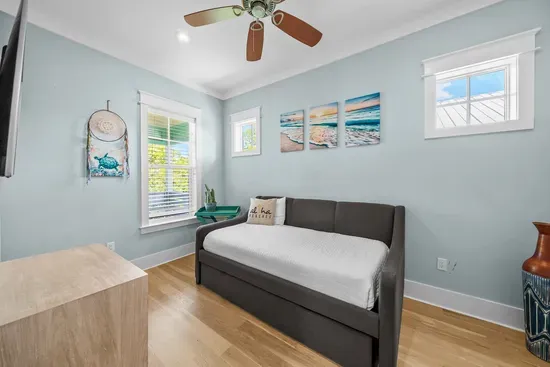 A twin daybed under the window, an easy spot for a younger guest to claim as their own.