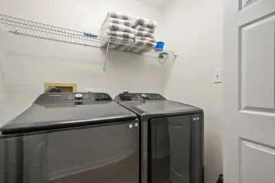 In-unit washer and dryer for added convenience during your stay. Both sides feature an identical laundry setup, making longer stays and beach days easy and stress-free.