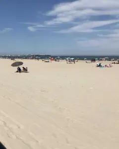 Hampton Beach with people sunbathing