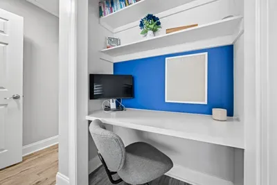 Workstation with monitor with outlet