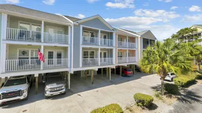Arial view of unit 202 with blue siding