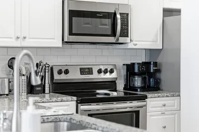 Kitchen over, microwave and dual coffee maker