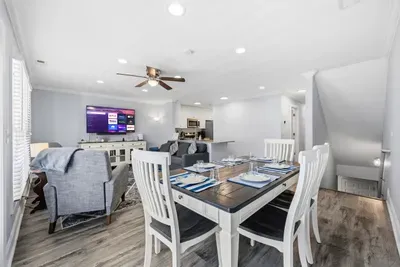 Dining room table, Living room and Kitchen view