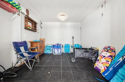 Storage with 8 beach chairs for guest