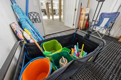 Beach wagon, umbrella's and toys