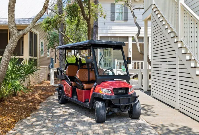 Yes, the golf cart’s included — a 6-seater, so the whole family rides together to the beach club, Camp WaterColor, or dinner in Seaside.