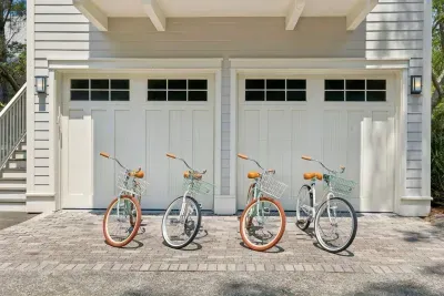 Four beach cruisers, ready to ride — coast the 30A trails with baskets made for towels and snacks.