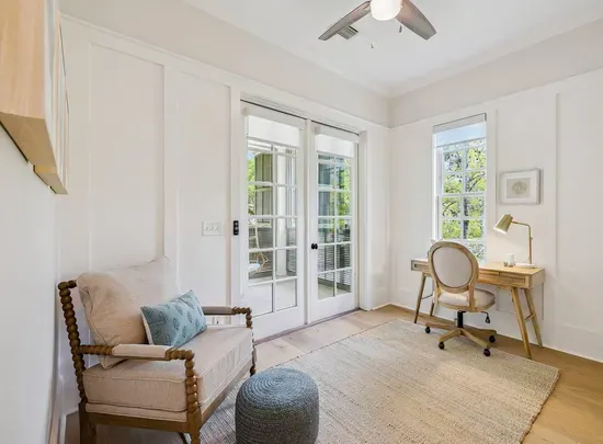 Have to check in with the office? A quiet dedicated desk with a porch view turns remote work into the easiest part of the day.
