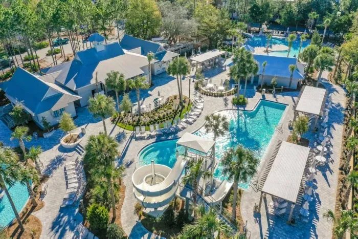 Say hello to Camp WaterColor — a pool playground with a waterslide the kids will ask for again and again.