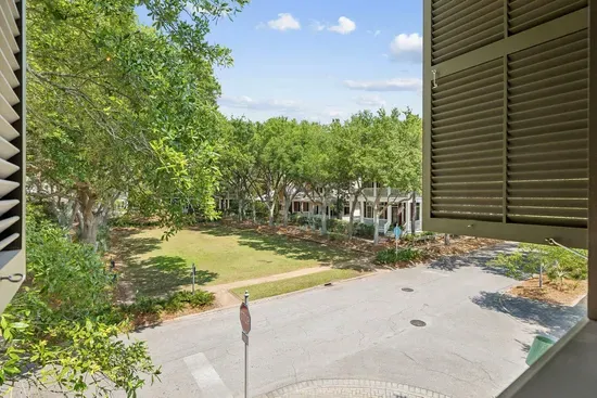 The view from up top: a leafy green park right across the street, with room to play just steps from your door.