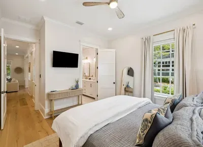 A king bedroom with its own ensuite and a smart TV — comfort and privacy in one. All bedrooms here have a private bath.