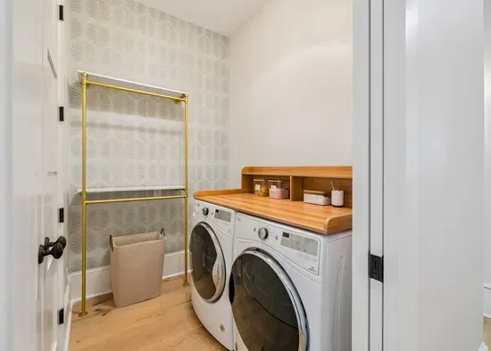 A full-size washer and dryer in the home — pack lighter, stay longer, and head home with clean clothes.