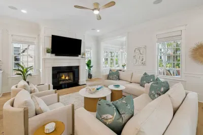 Room for the whole family to pile in — deep cushioned seating and a big smart TV for movie nights after a sun-soaked beach day.