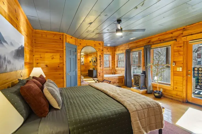 Wake up to a beautiful view from a comfortable king-size bed.