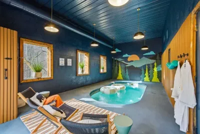 Private heated indoor pool on the lower level, designed for year-round relaxation. Please note that flotation devices in the pool for illustrative purposes only. They are not provided. Guests are welcome to bring their own if desired.
