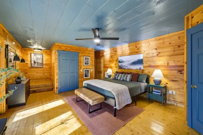 Relax in a comfortable king-size bed with a ceiling fan for added comfort.