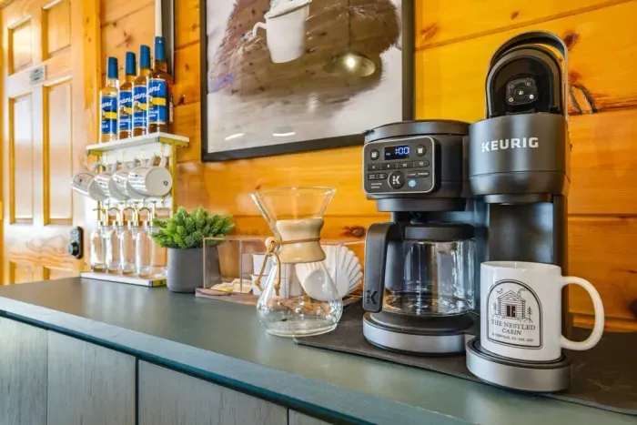 Enjoy your coffee using our logo coffee mugs—we’ve provided sugar and syrup for your convenience.