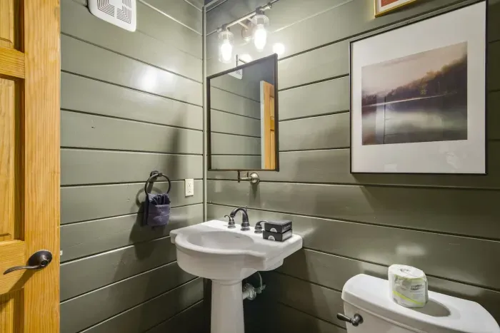 Convenient half bathroom located on the lower level.