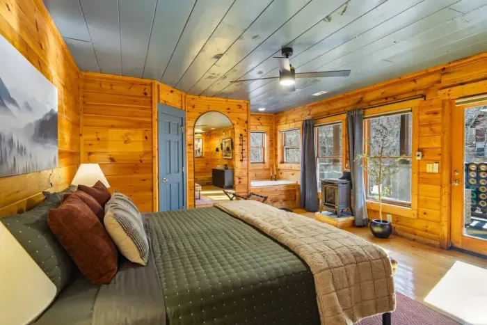 Wake up to a beautiful view from a comfortable king-size bed.