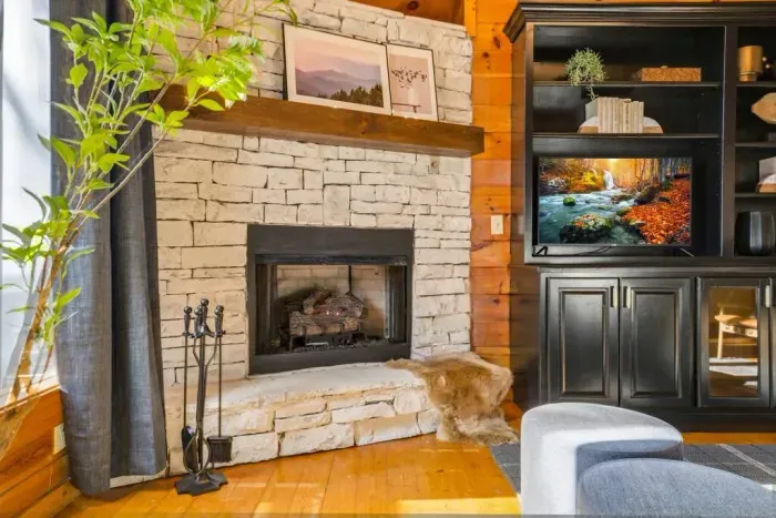 Unwind in the living room with a cozy fireplace.